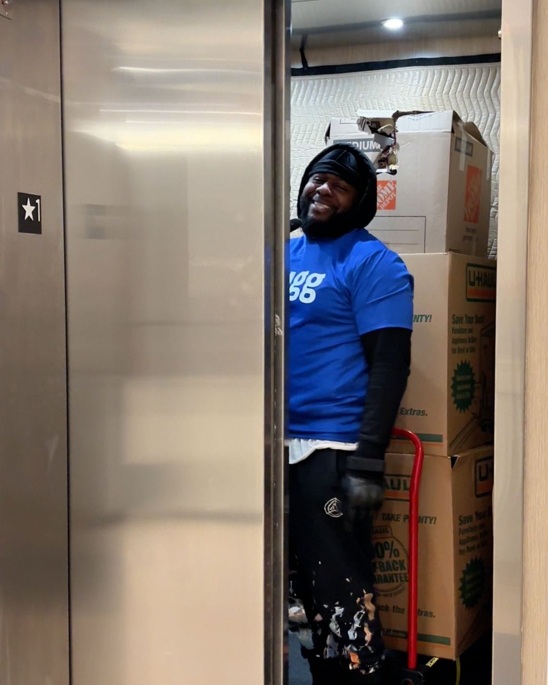 Lugg mover loading boxes into an elevator during an early morning move.