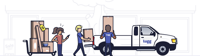 lugg movers loading tall boxes into white pickup truck