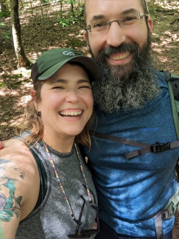 Stephanie and Dan smile at the camera in a selfie. 