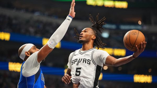 Spurs pull away in fourth quarter to beat Mavericks, earn first win of season