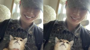 Kang Daniel Spotted on Leave in Full Military Gear, Beaming While Cuddling His Cat