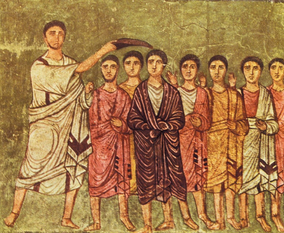 Old mural image of one dude pouring a horn of oil on another dude while other dudes look on, everybody in Roman robes Old mural image of one dude pouring a horn of oil on another dude while other dudes look on, everybody in Roman robes