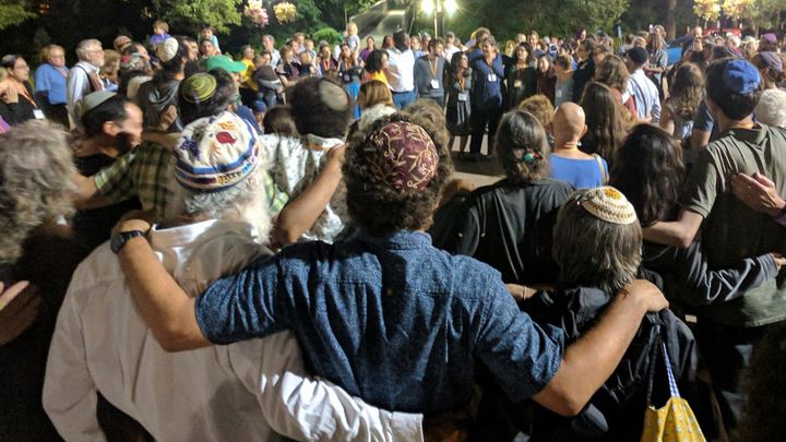 Bunch of Jews with arms around each other