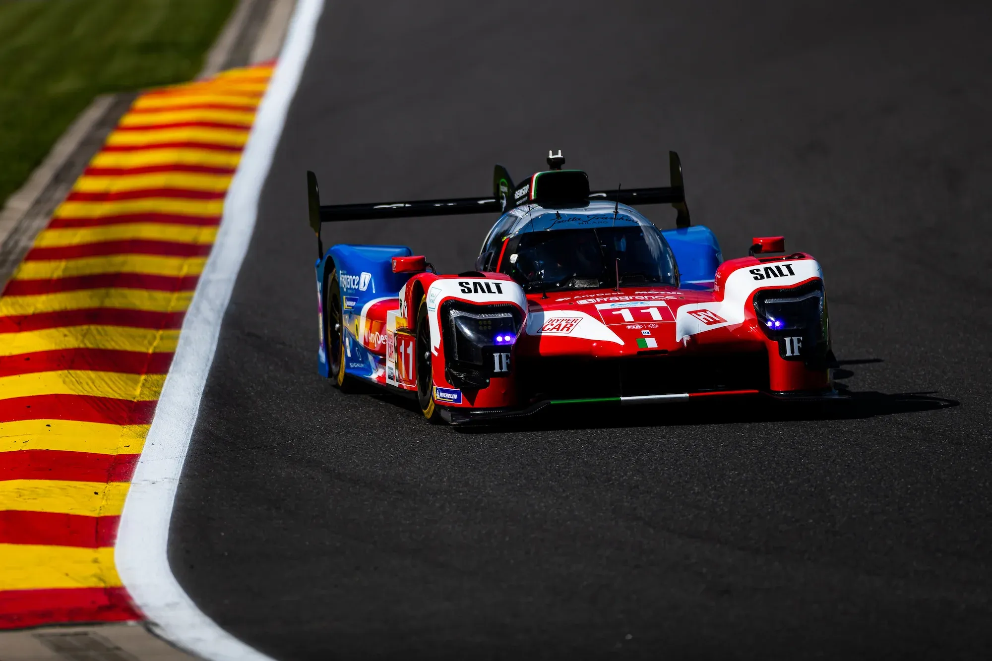 The Isotta Fraschini Tipo 6 LMH Competizione at Spa-Francorchamps in 2024, turning into a left hand corner