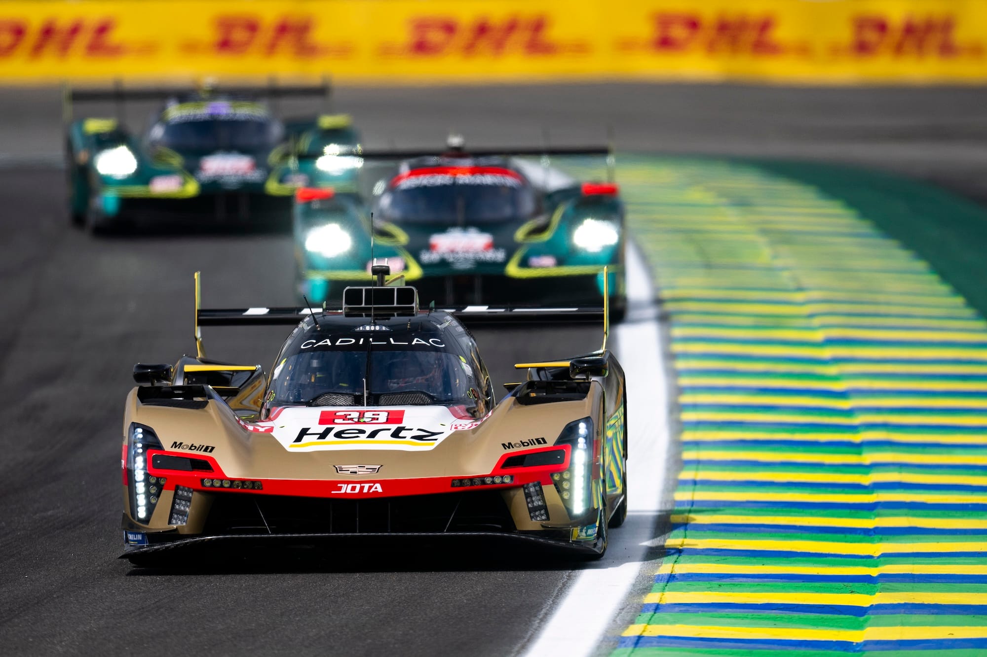 The #38 Cadillac followed by two Aston Martin Valkyries at Interlagos, 2025