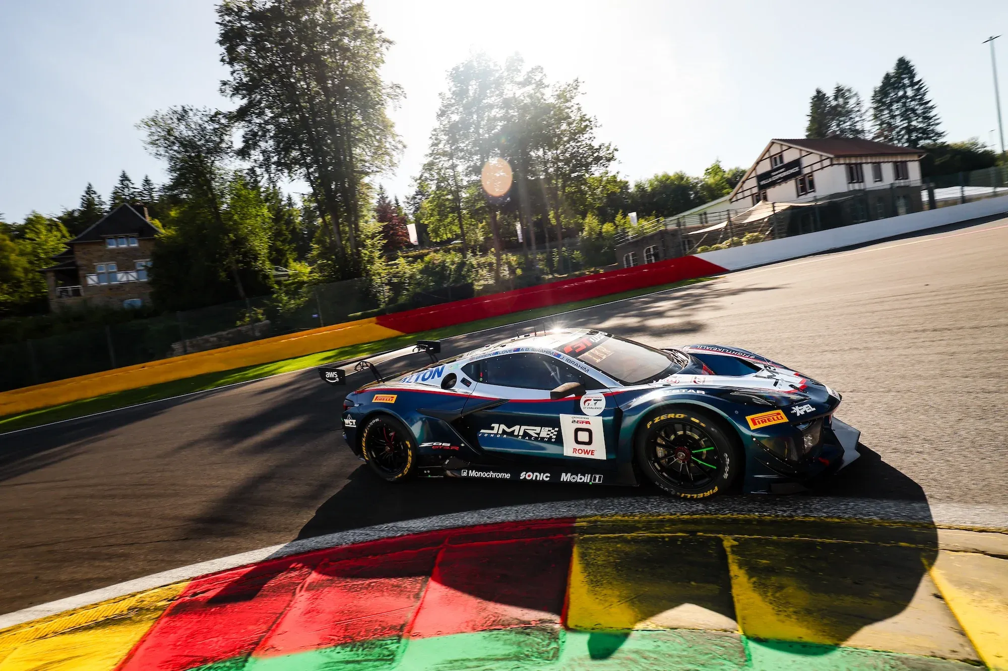 A Chevrolet Corvette Z06 GT3R on the apex at La Source corner in Spa