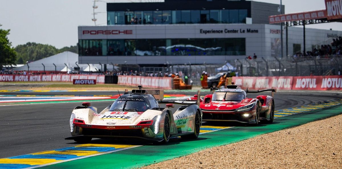 A Cadillac V-Series.R chased by a Toyota TR010 at Le Mans 2026, with both cars exiting the final Ford chicane to end the lap