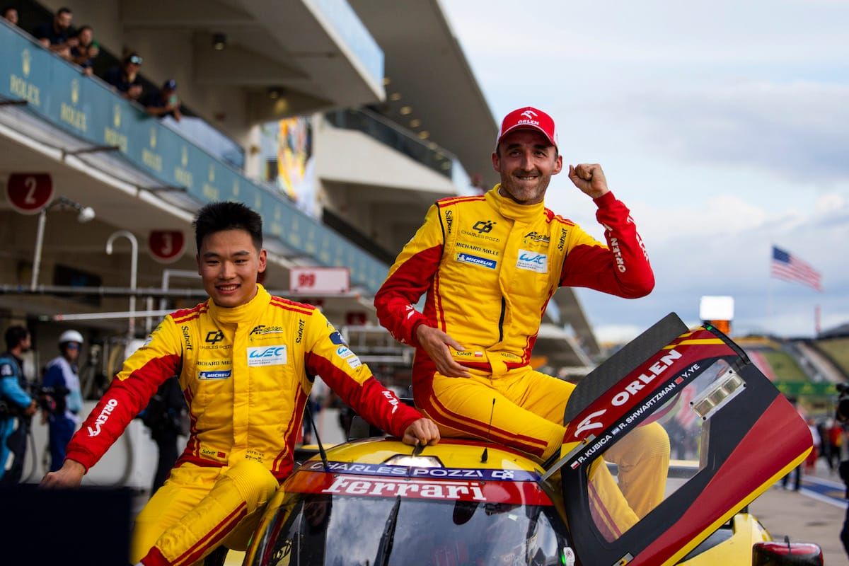 Yifei Ye, Robert Kubica, Robert Schwartzman (#83 AF Corse Ferrari 499P) celebrate their win at COTA.