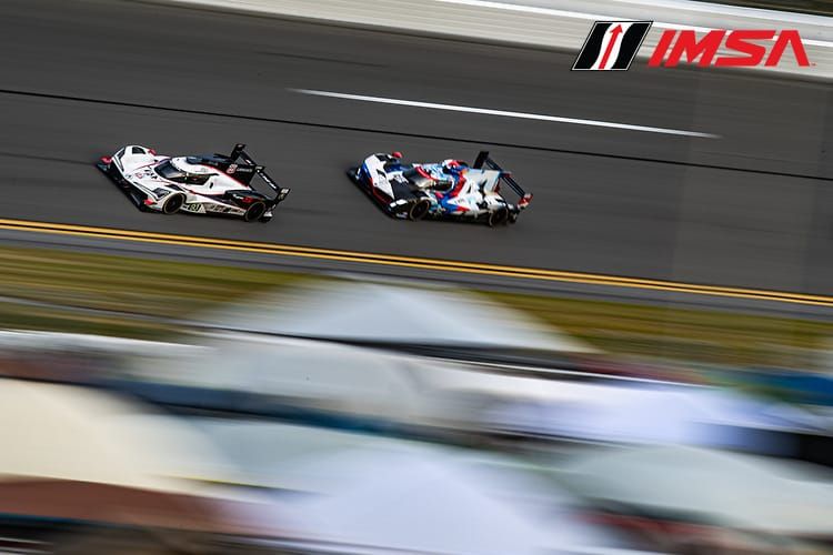 The Acura ARX-06 and BMW M Hybrid V8 on the Daytona banking, during the Roar test.
