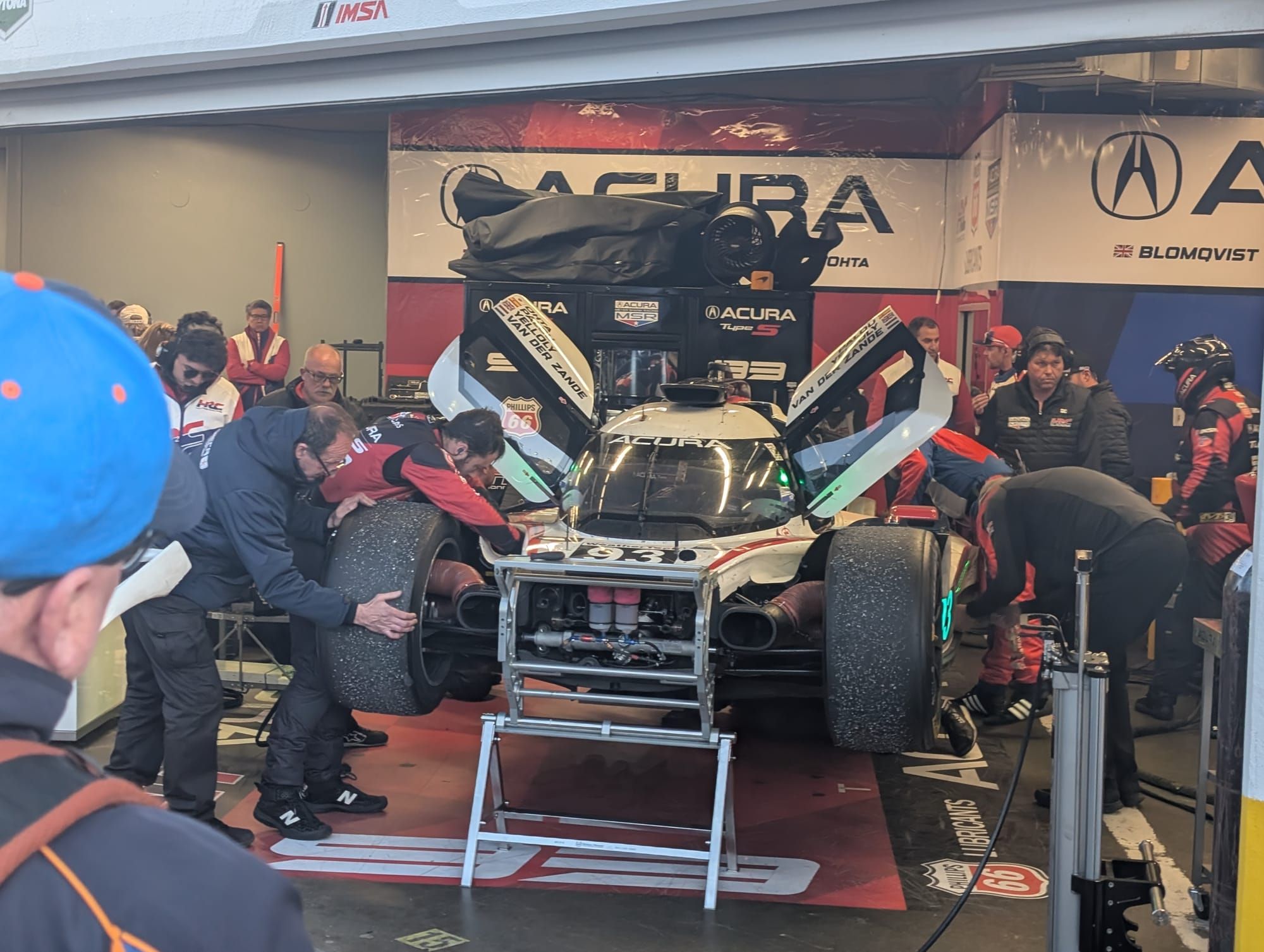 #93 MSR Acura in garage at Daytona with rear left suspension failure