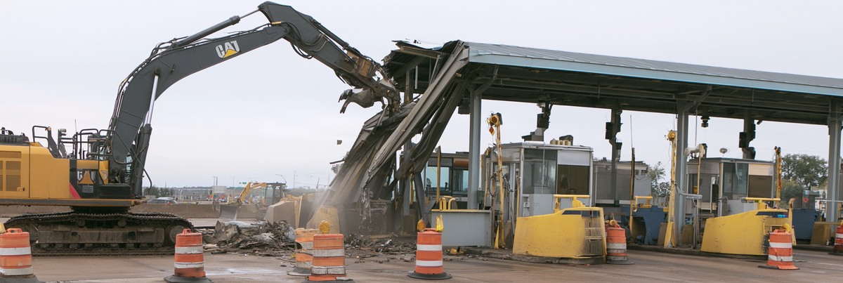 Toll booth being destroyed