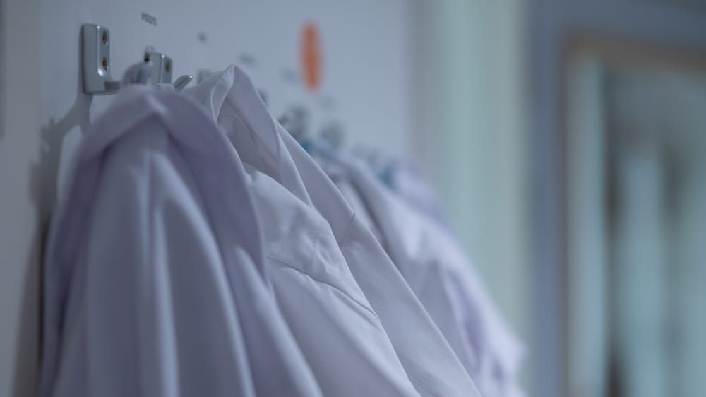 Slipping into another's lab coat