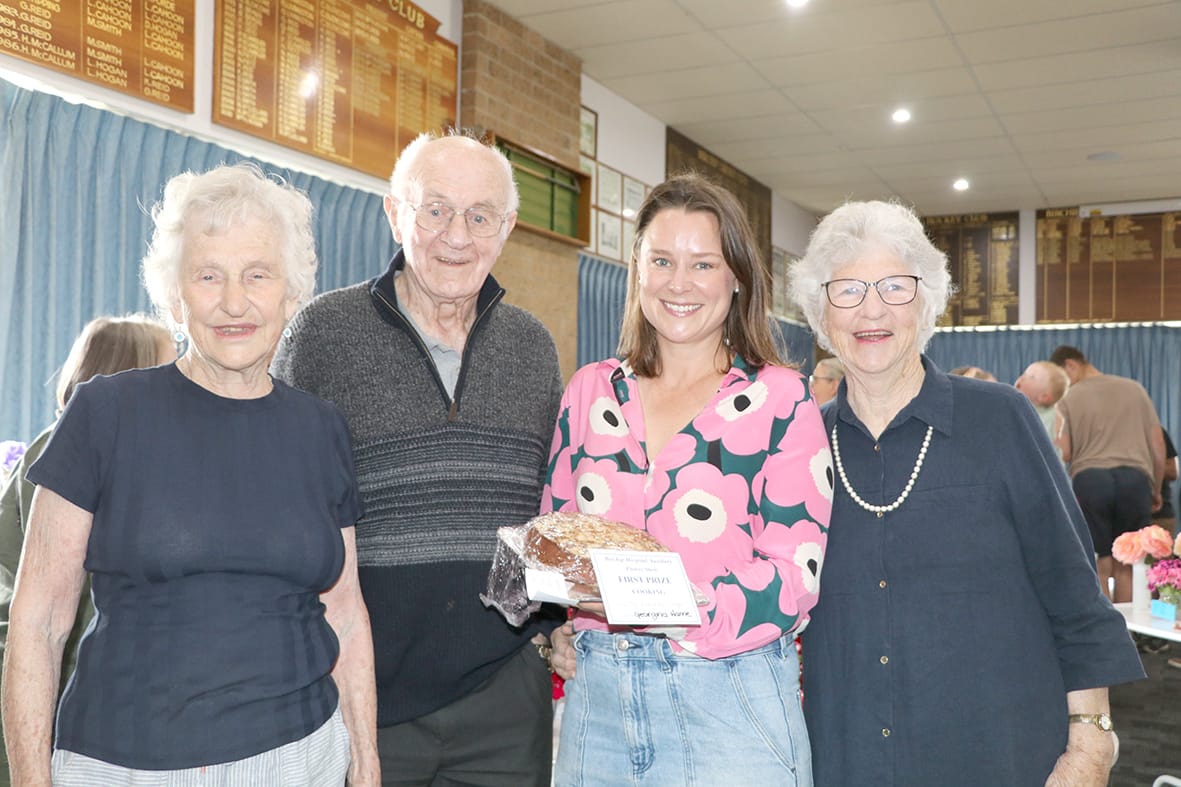 Georgie Warne with one of her winning exhibits with her visiting aunts and uncles Beverly Bromham, Barry Boham, and Chris Bett.