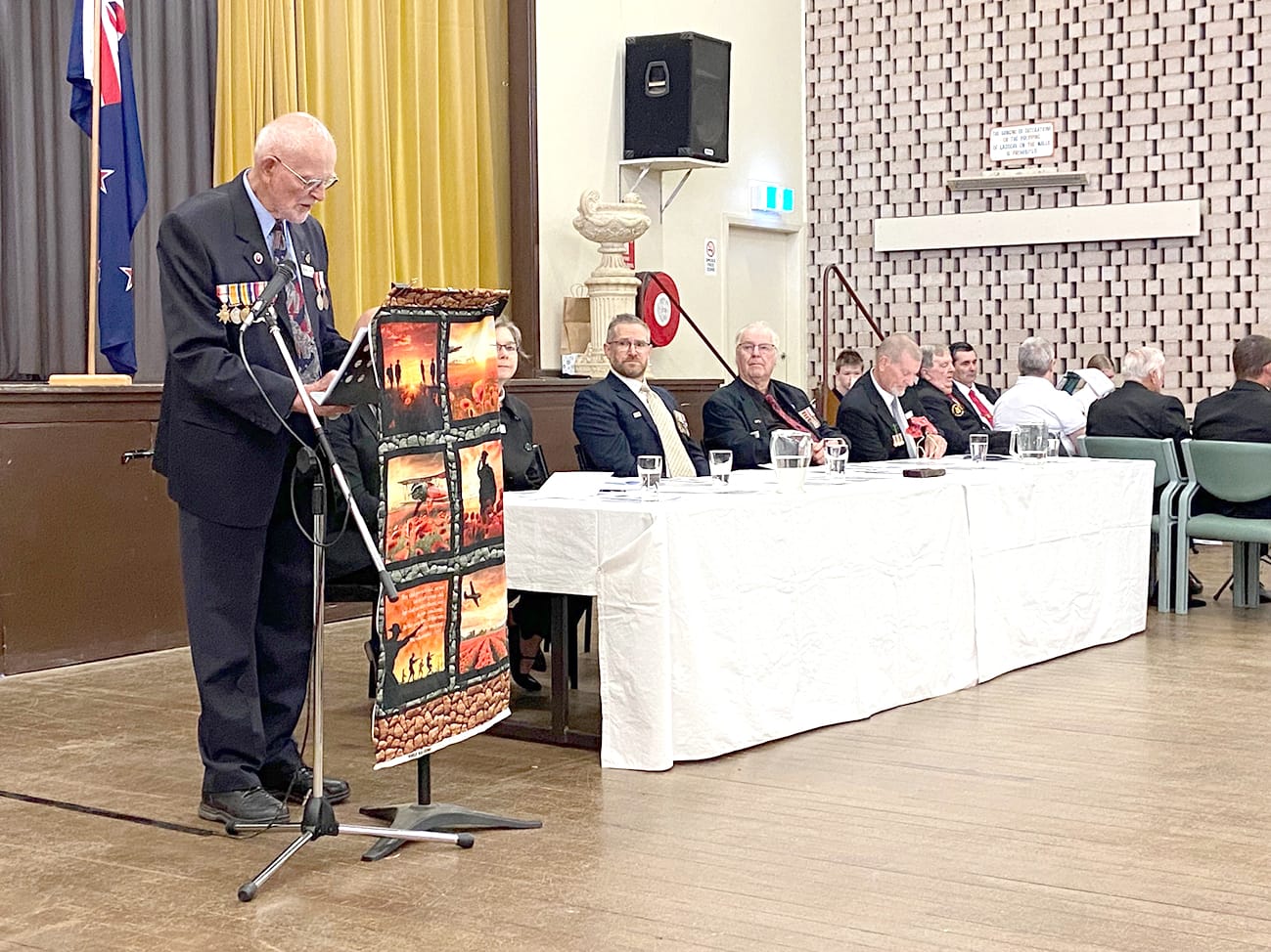 RSL Secretary Bill Freeman addresses the crowd at the Charlton Hall during the ceremony.