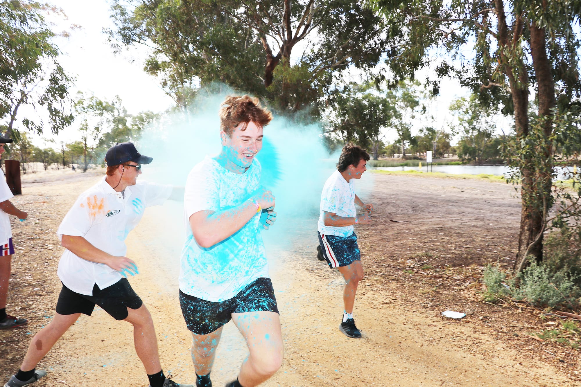 Youth Group member Tadhg Lowry colours Josh Woods and Connor Boyle.