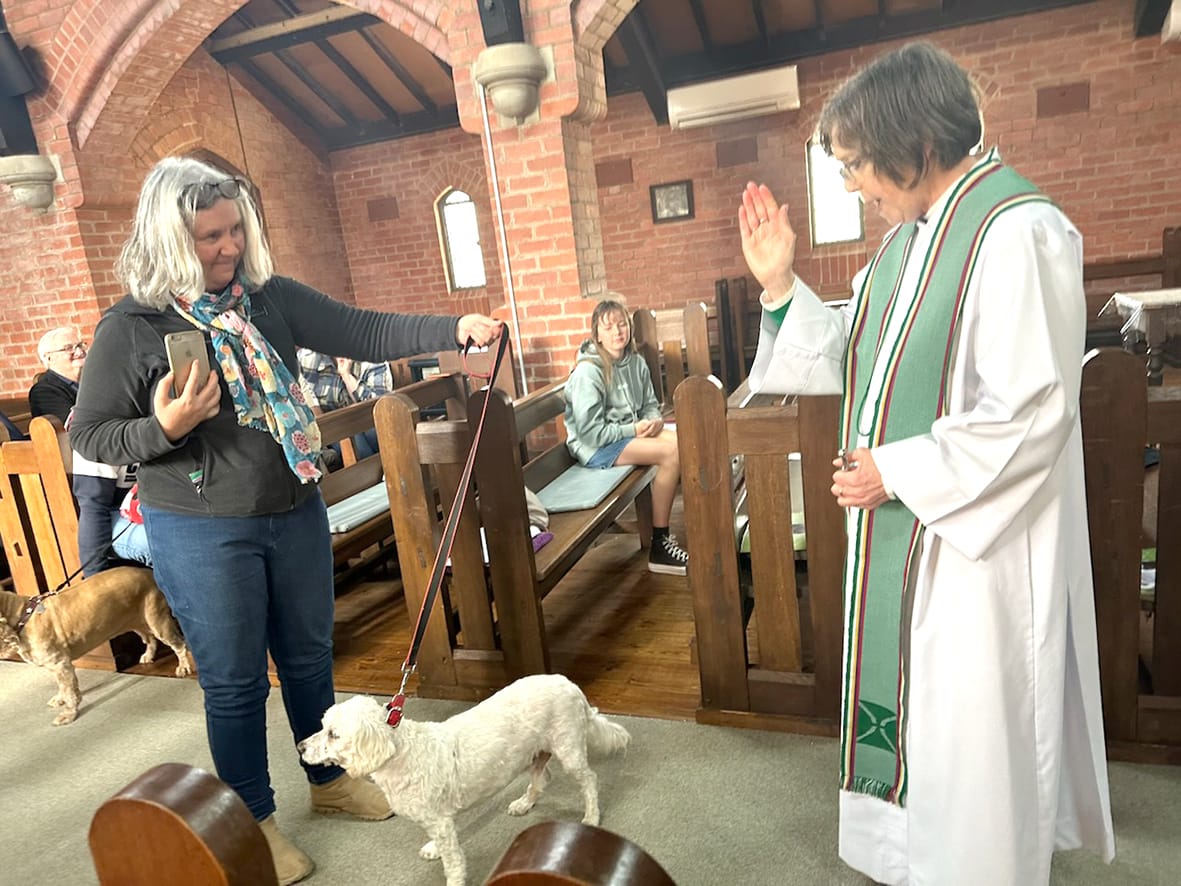 Berlinda Clarke with Dexter getting the blessing from Rev Judi Bird.