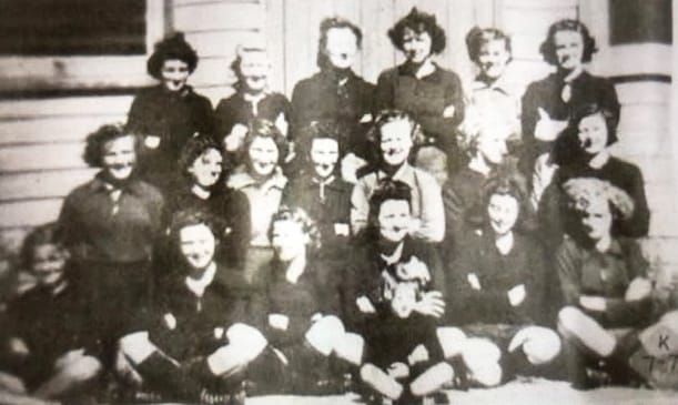 From “Nullawil – A Folk History” by the Centenary Committee, Nullawil 1950 Ladies’ football team: back row, Rene White, May Bennett, Kate Scanlon, Anna Sheahan, Dorothy Watts, Mary Vallance. Middle row, Valma Watts, Marlene Hogan, Dorothy Brunt, Kath White, Dulcie Watts, Judy Pollington, Gwenda Duncan; front row, Lesley Humphries, Jeannie Martinson, Dulcie McKenzie, June Vallance, Dorothy Stahl and Nancy Pollington. Mascot: Dianne White (sitting in front).
