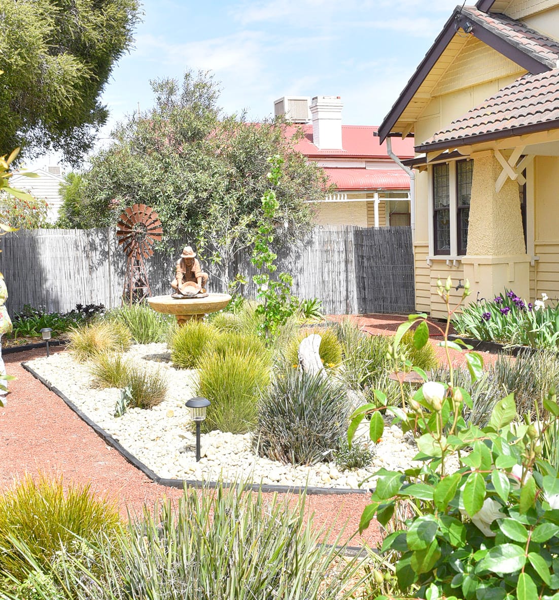 In the space of two years, the front garden of Tanya and Mark Windsor’s home has been transformed from an overgrown jungle to a drought-tolerant, low maintenance plot which complements the era of their home. 