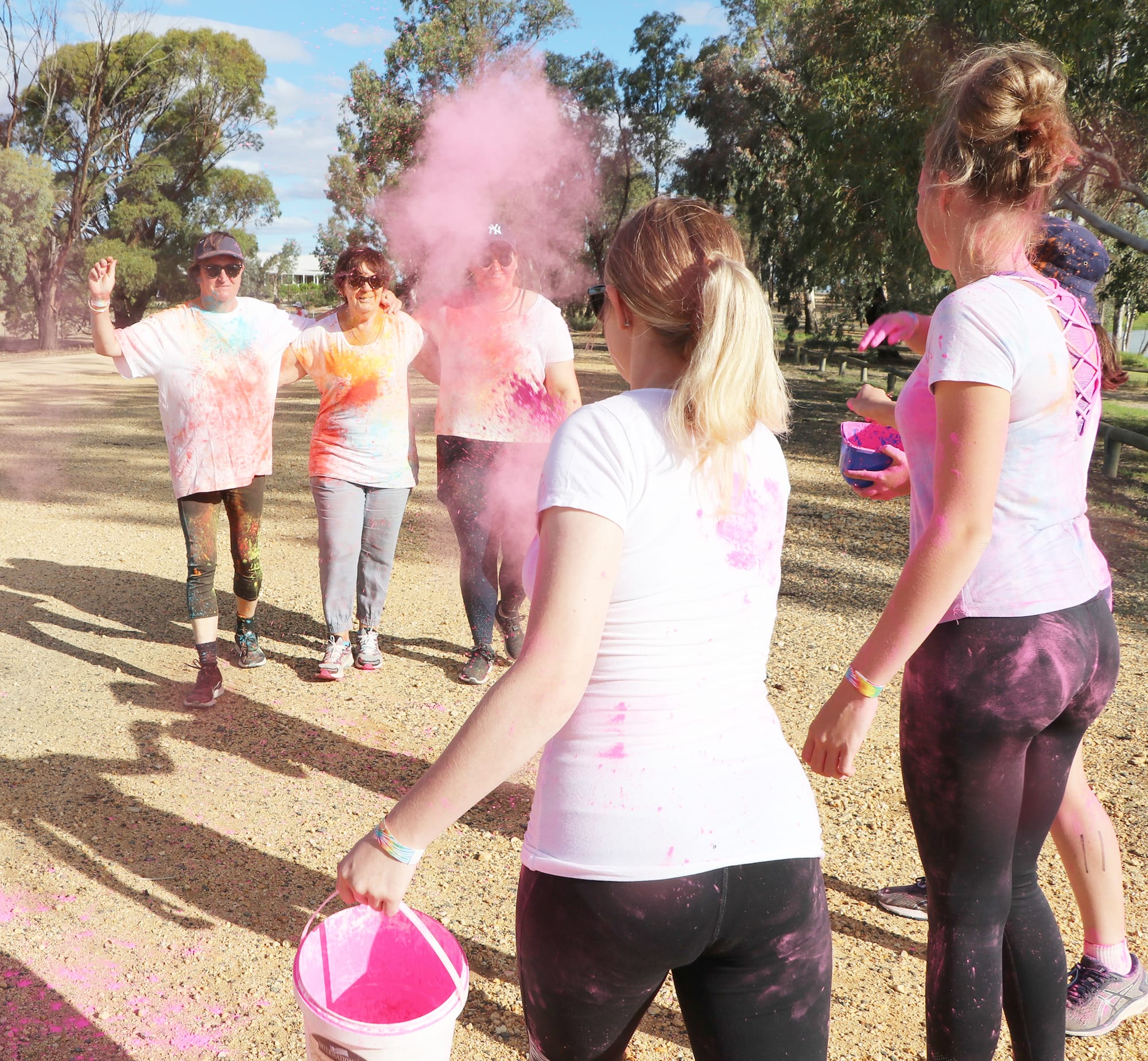 Prue McCredden, Vivienne Townsend, Bridget McCredden being coloured by Youth Group members Gemma Woods, Hannah Cook and Ella Hogan.