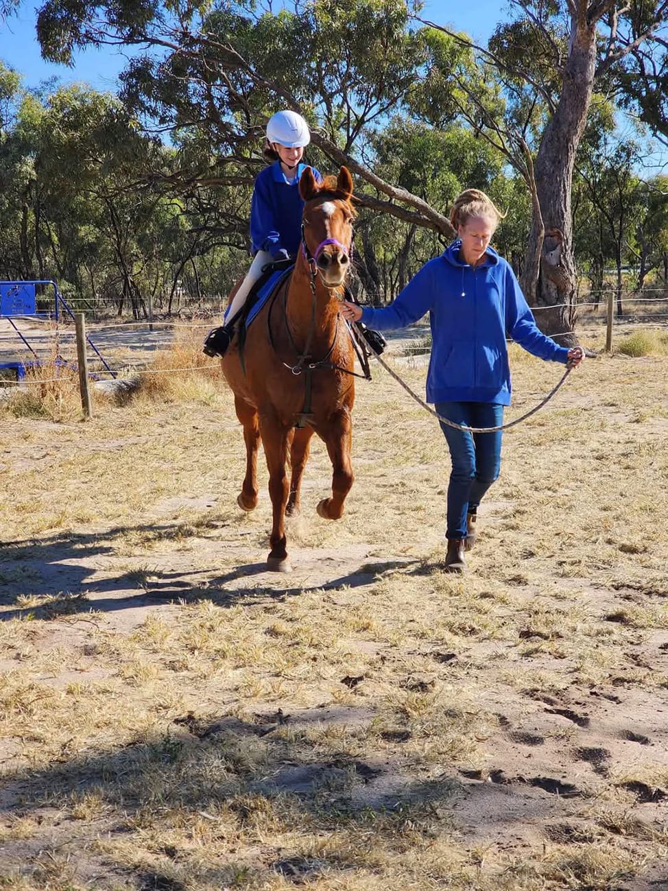 Kendra Clark on Bomber, with Samantha Clark leading.