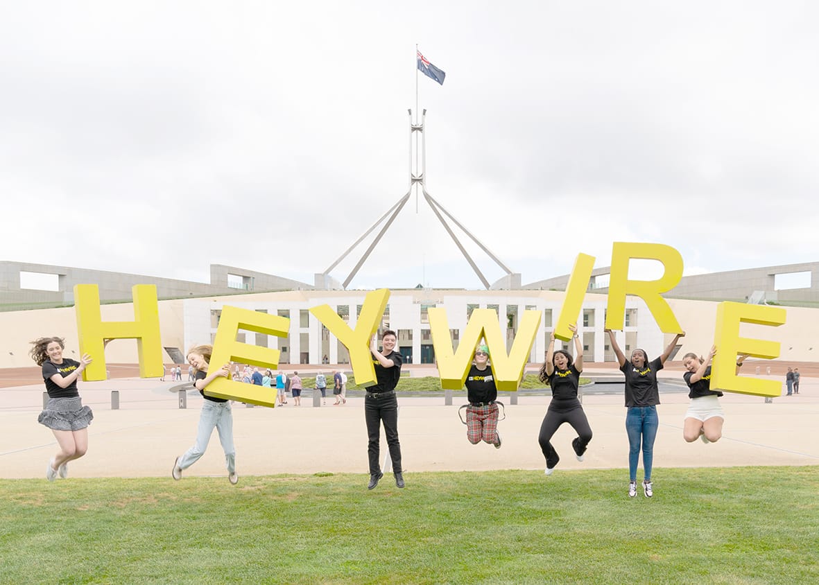 Heywire winners pictured in front of Parliament House.