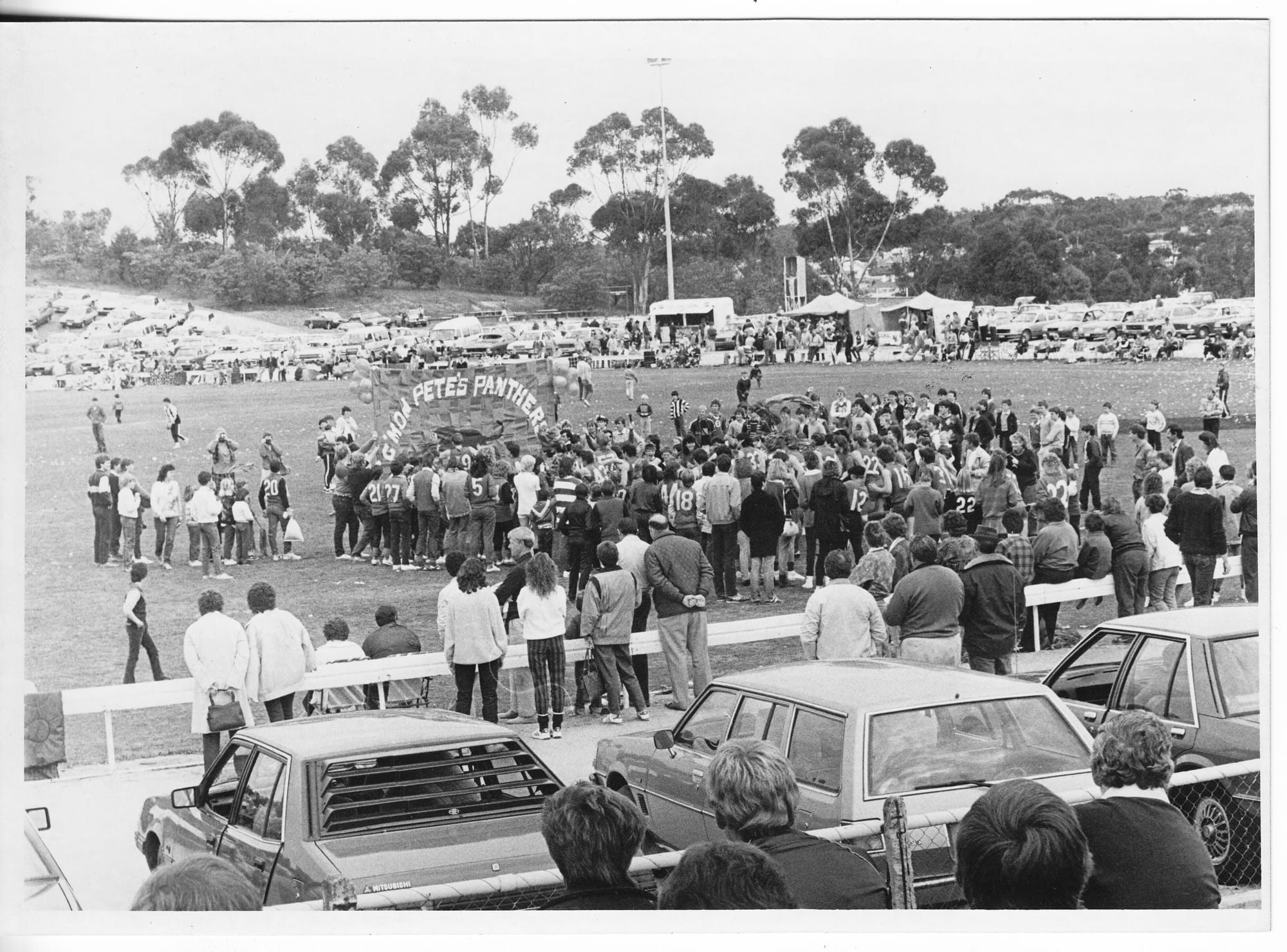 Grand final day at St. Arnaud, as the Watchem-Corack reserves run through their banner.