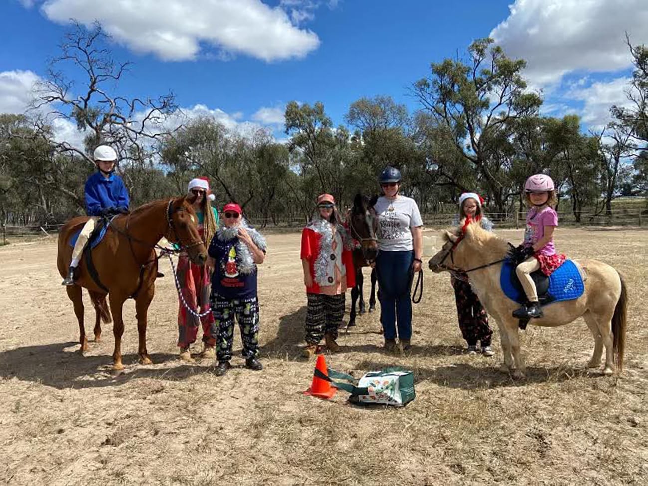 Last year’s Christmas break-up rally, left to right: Kendra Clark on Bomber, Samantha Clark, Jill McEwen, Tayla Wyllie, Melinda McEwen holding Fred, Erin Clark and Kallani Fisher on Mumsie.