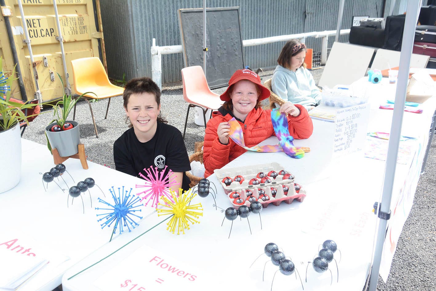 Young entrepreneurs, Oakley Brennan (right, with his Oakley’s Golf Ball Creations), and Victory Davis and her Vibrant Victory socks.