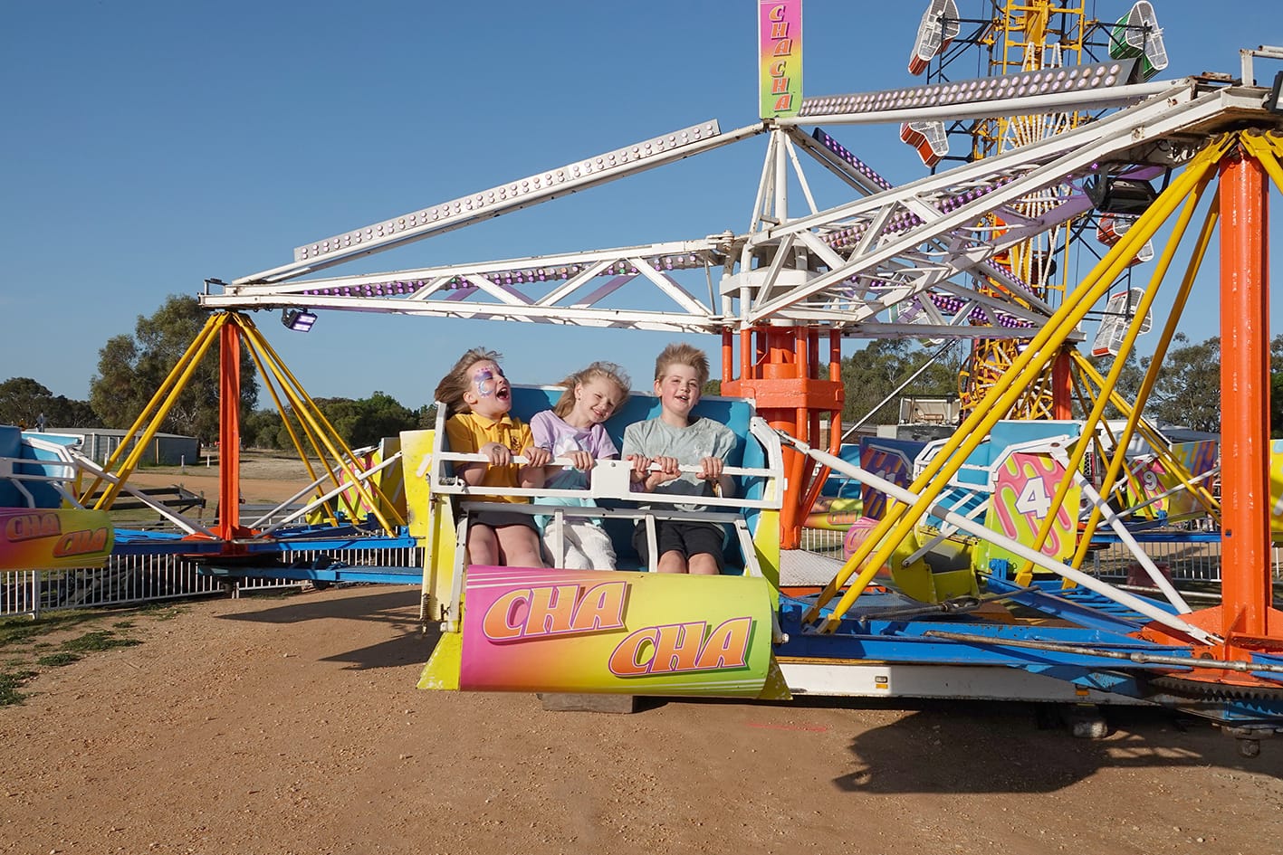 On Show Day, nothing is more popular, particularly with the younger brigade, than the Cha Cha ride. Here, the thrill of taking to the air is written all over the faces of Holly Goldsmith, Charlotte Perry and Tobey King.