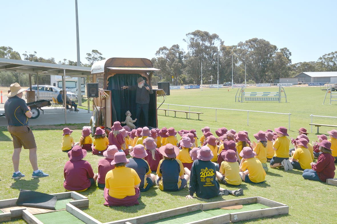 Primary school students watch Professor Wallace in action on Friday afternoon.