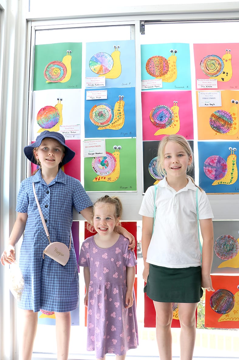 Harper, Tessa and Lucy Noonan with some of their winning art work.