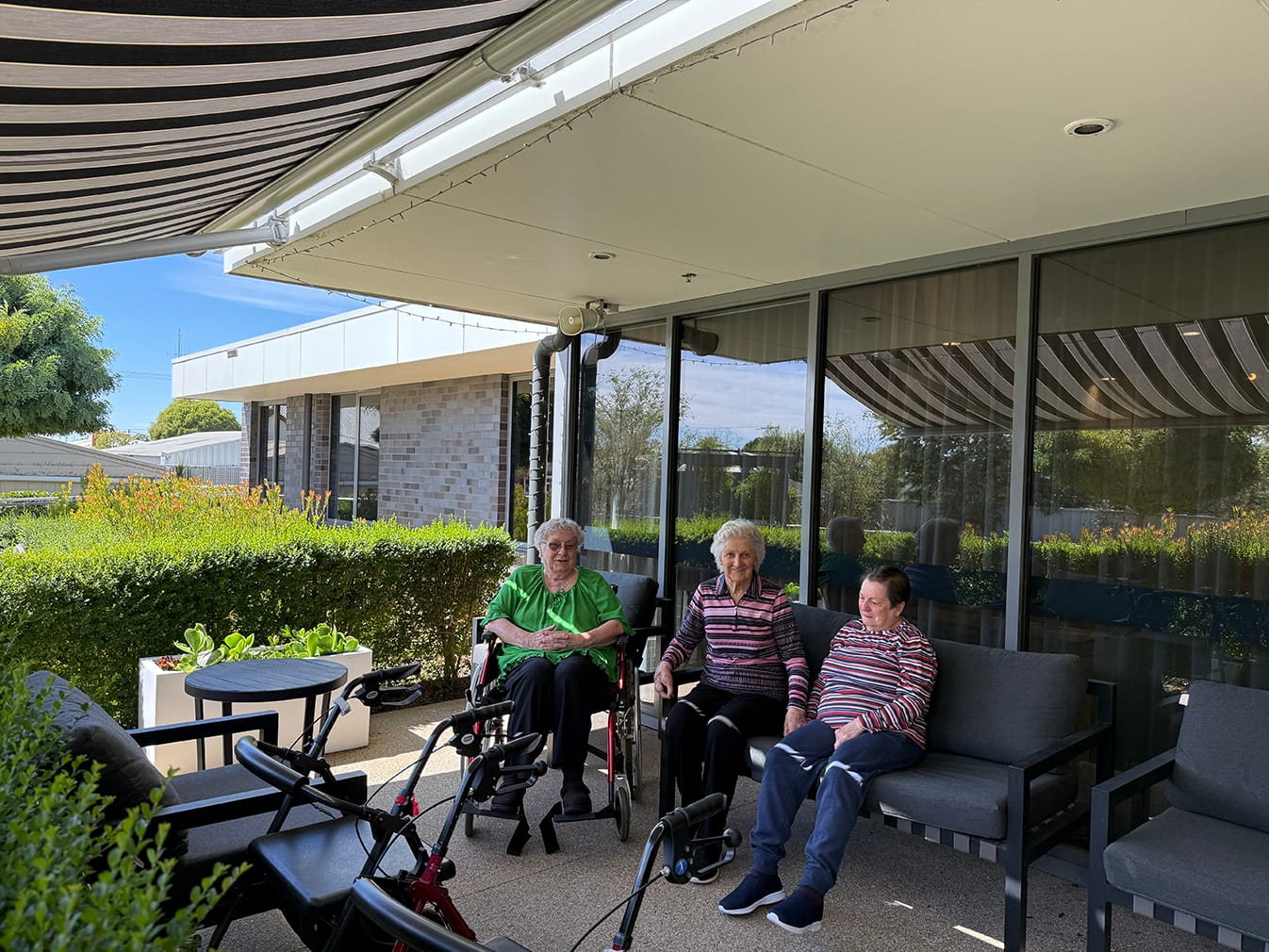 Mavis Gould, Brenda McCredden and Judy Bowen enjoying the outdoor facilities and the shade awning purchased by the auxillary with M2M funds.