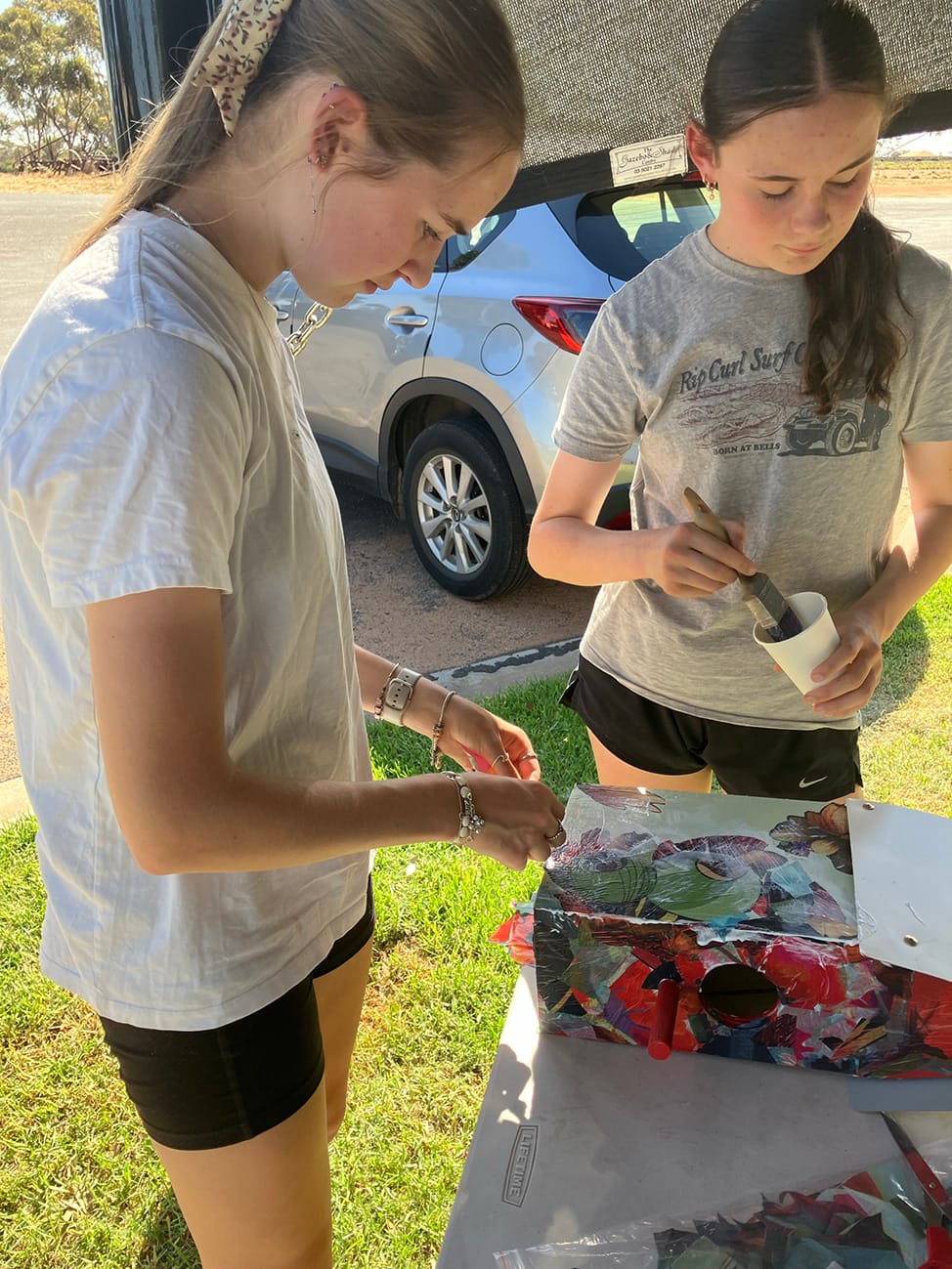 Nandaly: L-R Immersing themselves in the art of decoupage at the Nandaly workshop, transforming ordinary objects into beautiful designs are Millar and Jenna Stewart.