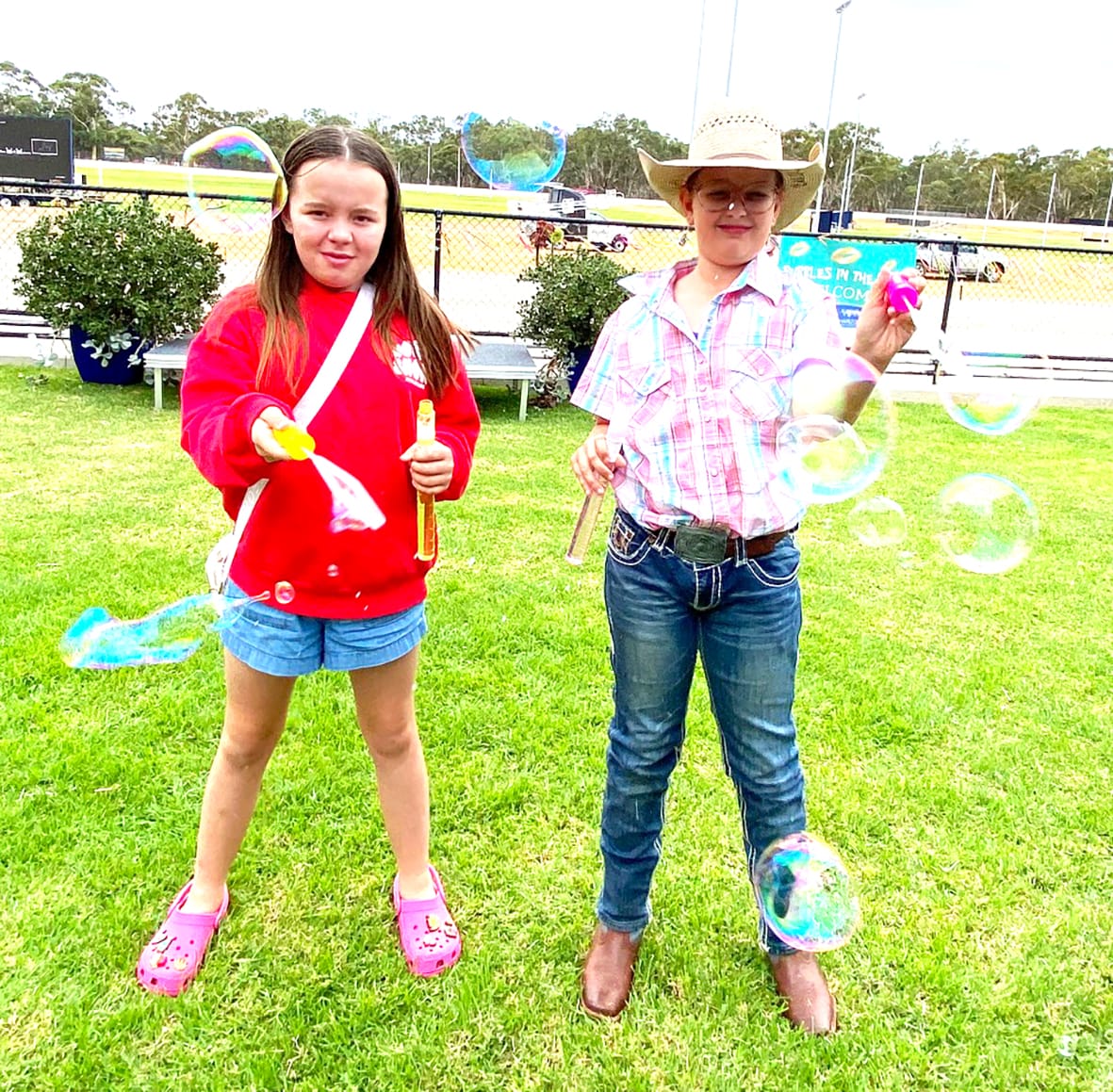 Bubbles were an important part of the day especially for visitors (left and right) Isabelle Jamieson and Josie Williams.