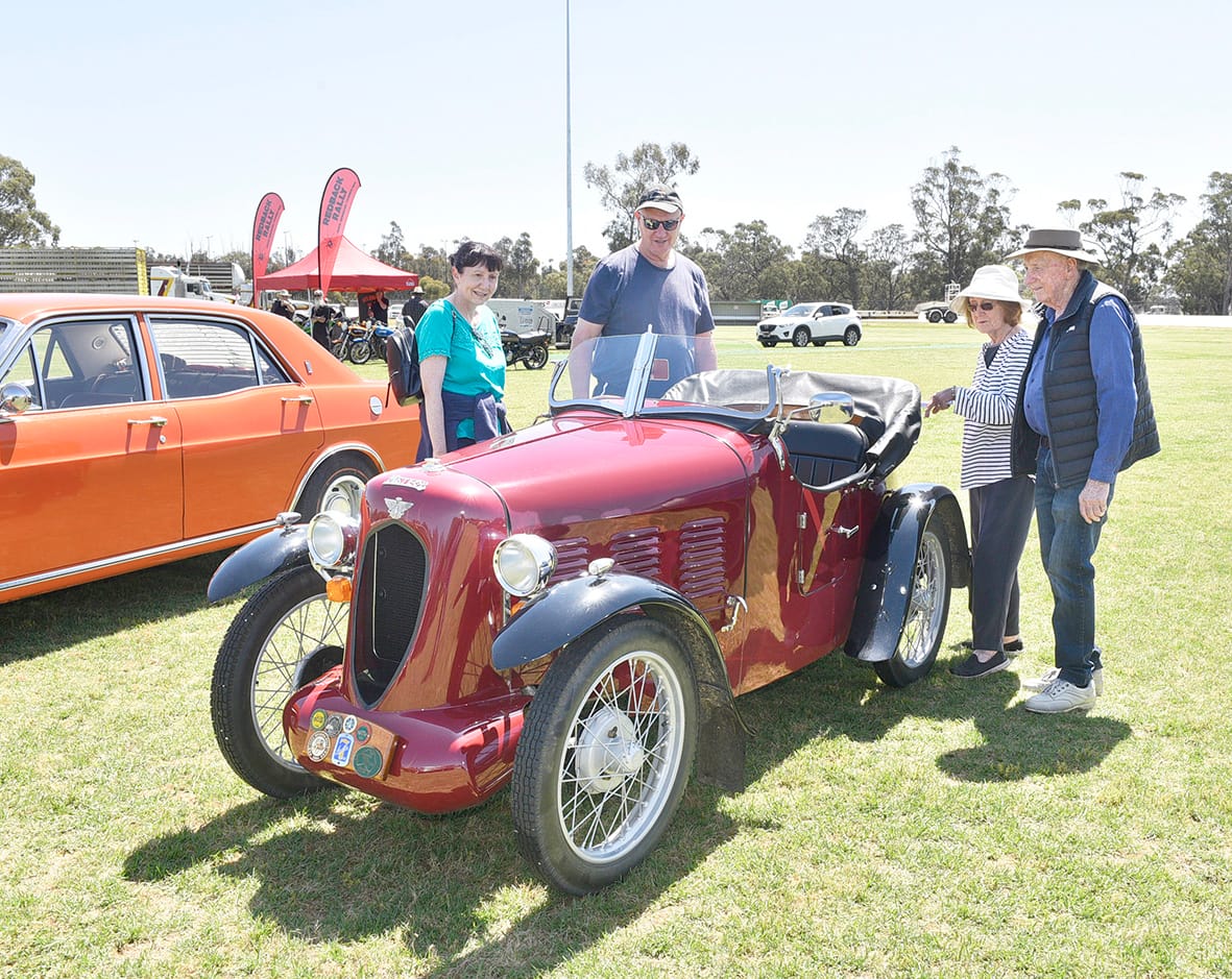 The vintage car display by Charlton Club Wheels on A79 drew many interested onlookers – with Wycheproof visitors (left to right) Jan and Pete Howell and Tilly and Stan Prater admiring the immaculate Austin 7 Meteor. 