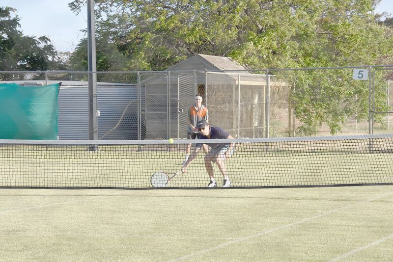 Tight Tennis Under Lights post image