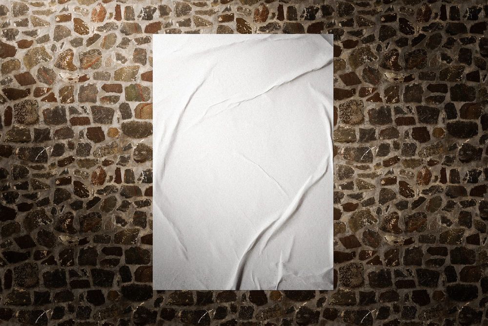 Glued Poster Mockup On Rock Wall Background