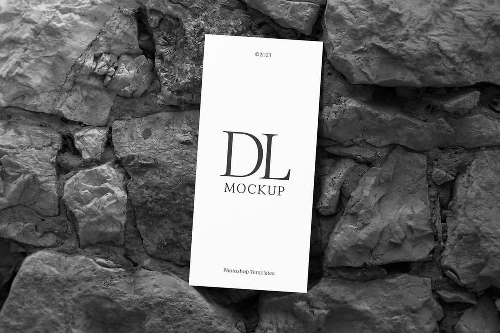 DL Card Mockup on Stone Texture Wall