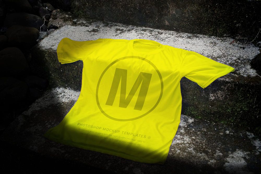 Realistic Yellow Tee Laying on Stone Steps