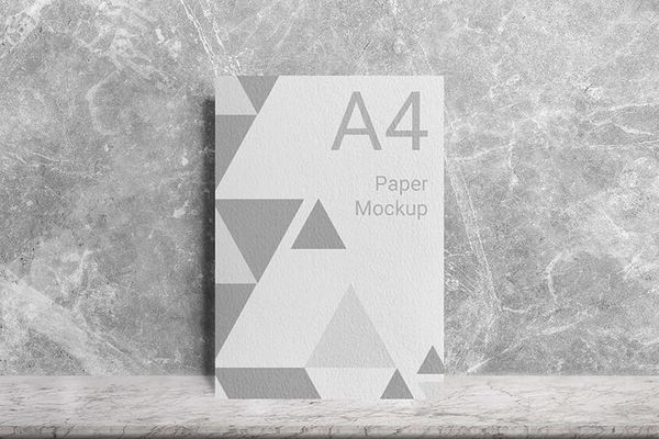 Realistic A4 Paper Mockup Lean On Cement Wall Background
