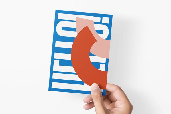 Man Holding Paper Mockup