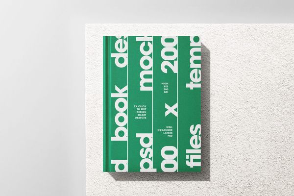 Book Mockup on Wall Surface