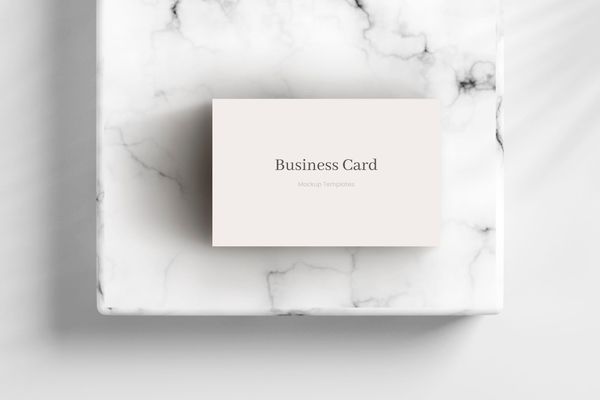 Business Card Mockup on White Marble Podium