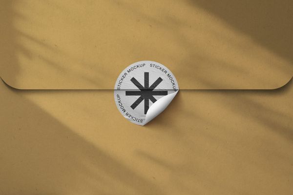 Glued Sticker Mockup With Envelope Background