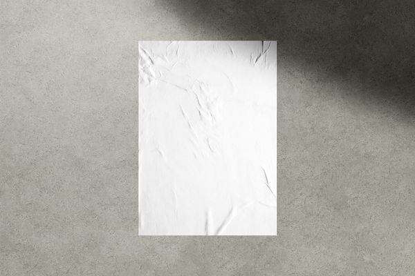 Glued Poster Mockup on Wall Background