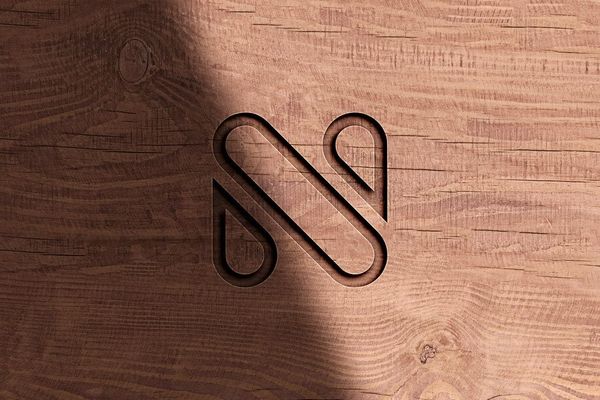 Modern Minimalist Logo Carved on Wood