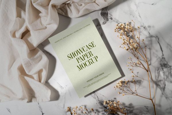 Elegant A4 Showcase Paper Mockup on Marble Surface