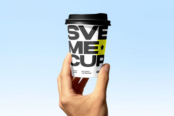Hand Holding Coffee Cup Mockup