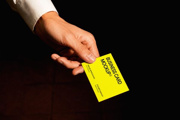 Business Card Mockup Hand Holding Dark Background
