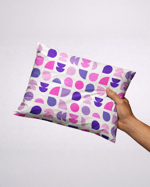 Hand Holding Pillow Mockup